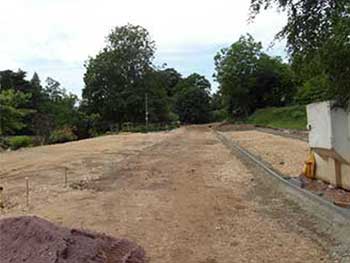 This is the access road above the Plant Centre, showing Plant Centre pick-up parking bays on either side