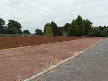 The topsoil to the left of these stone parking bays willbe a space for picnic benches, surrounded by grass which will be seeded naturally and with 'hay-strewing' to ensure that local floral thrive