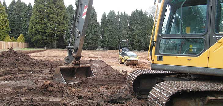 A digger and a roller